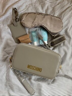 Moschino grey Dopp kit with travel essentials